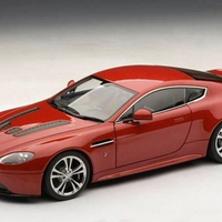 ASTON MARTIN V12 VANTAGE S BURNT ORANGE 1/24, DIECAST CAR, COLLECTABLE CAR.